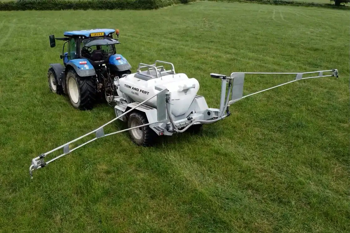 Tow and Fert being pulled by a Tractor